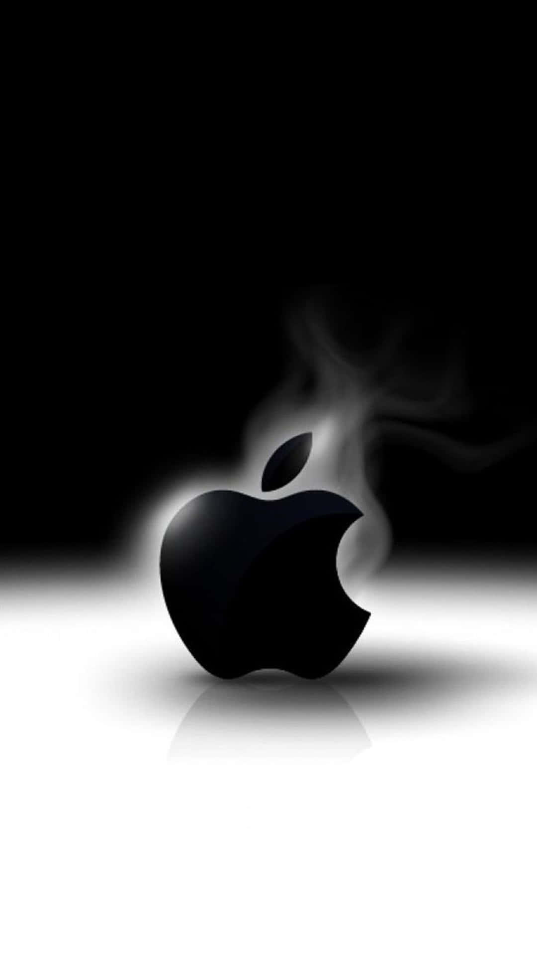 黑白漸變背景上冒煙的黑色Apple標誌