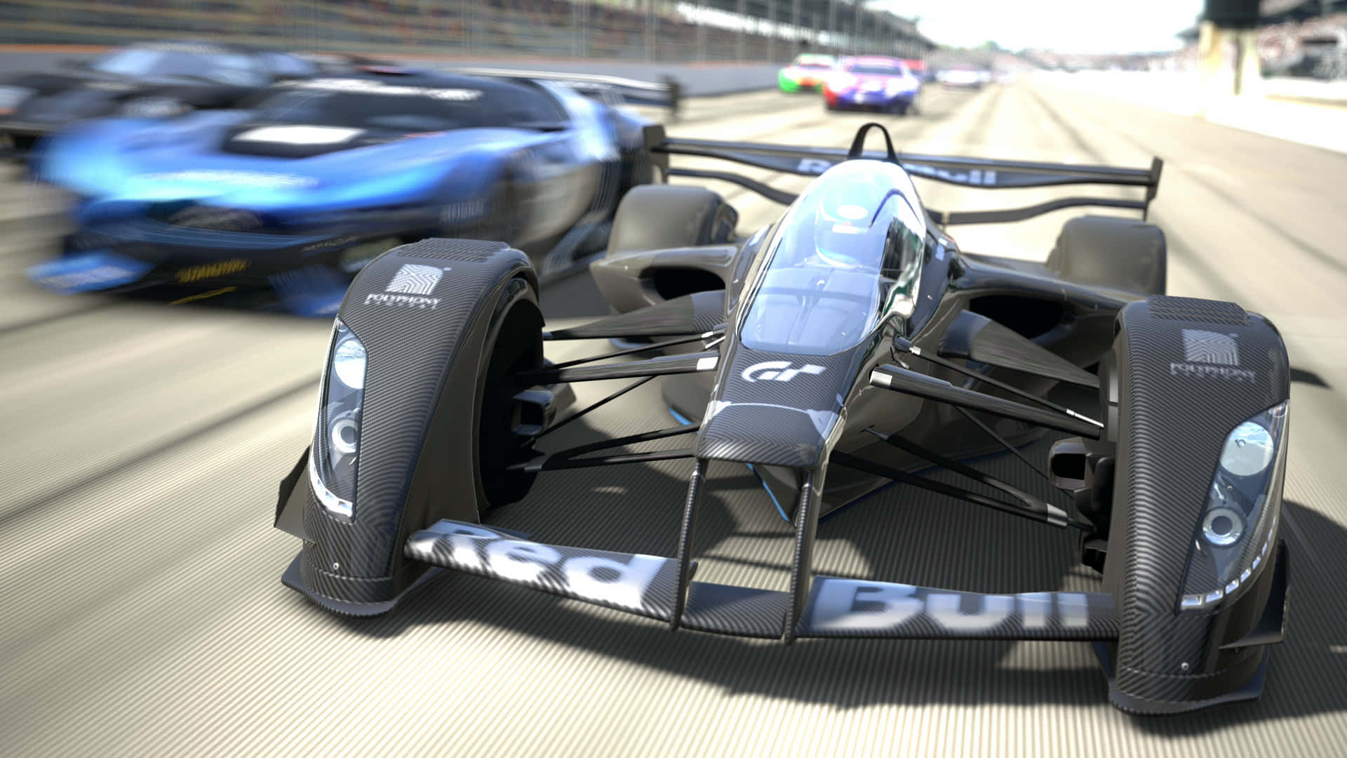 黑藍賽車疾馳 壁紙 — 一架流線型黑色 Formula E 賽車在陽光明媚的賽道上疾馳，背景中有模糊的競爭對手。