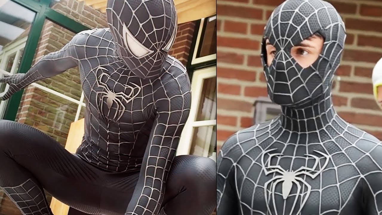 黑蜘蛛人Cosplay 壁紙 — 一個穿著黑白蜘蛛主題服裝的人，在磚牆背景下動態擺姿勢。