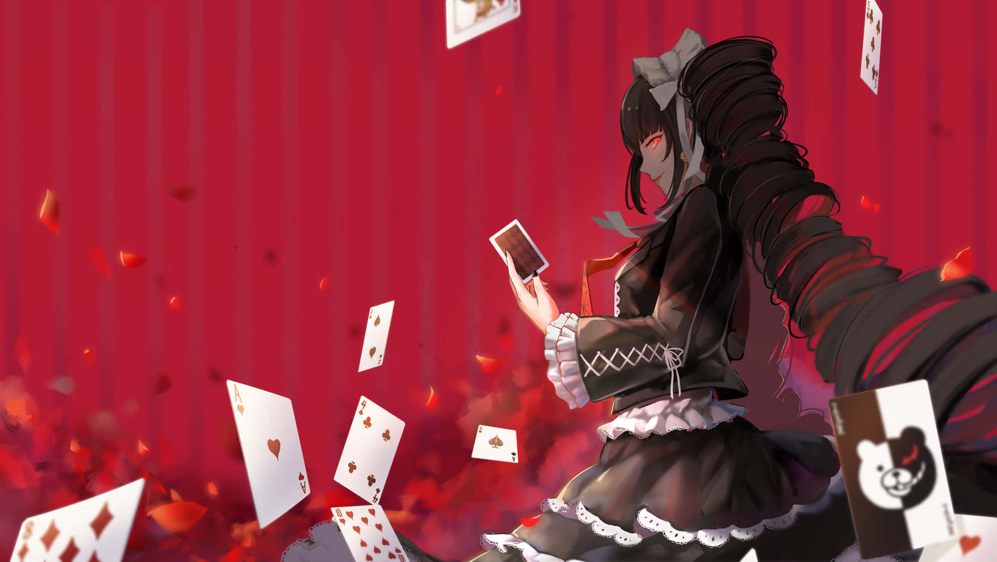 黑裙少女手持撲克牌 壁紙