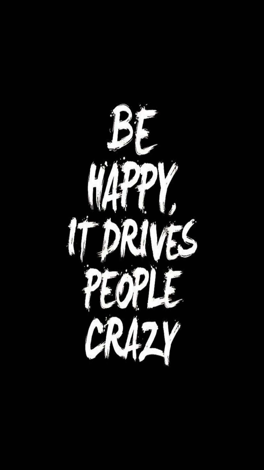 白色筆觸文字在黑色背景上寫著「Be happy it drives people crazy」。
