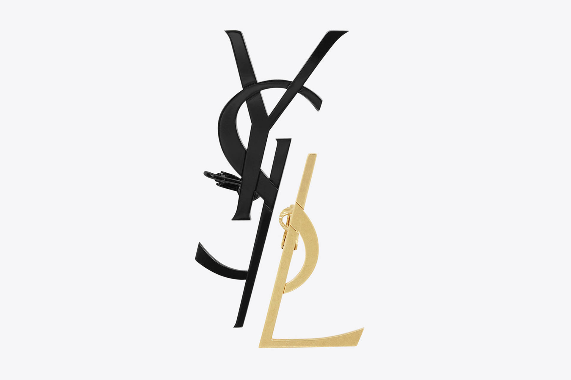白色背景上的黑金YSL標誌