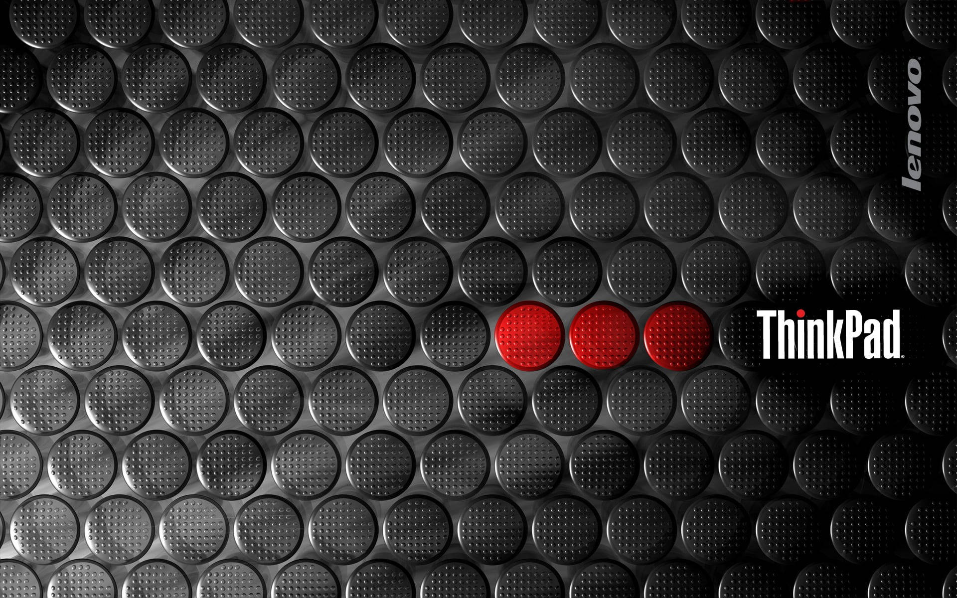 黑色穿孔金屬表面，帶有三個紅點和 Lenovo ThinkPad 標誌。
