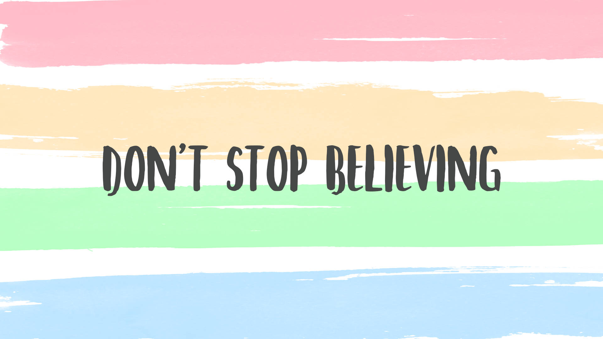 勵志名言 'don't stop believing' 在粉彩筆觸背景上。