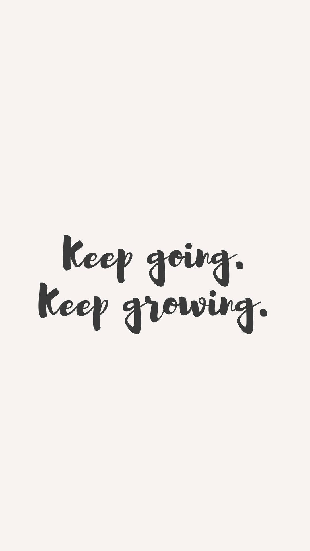 勵志語錄 keep going keep growing 以黑色字體寫在米色背景上