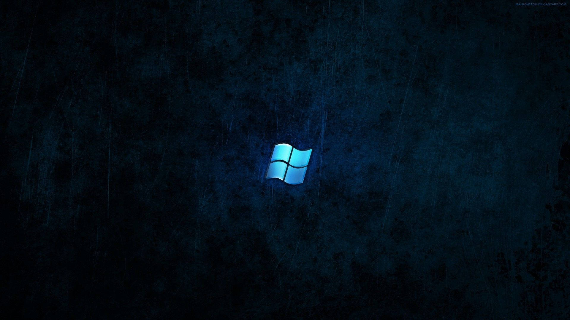 深色雨景背景上發光的Windows標誌