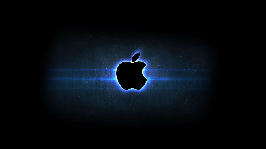 發光的藍色Apple標誌,置於帶有鏡頭光暈效果的深色紋理背景上。