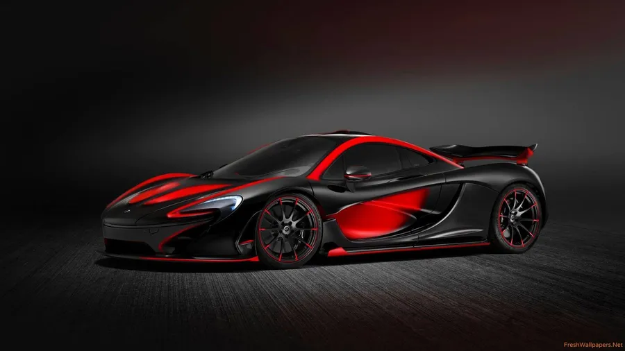 黑色McLaren跑車在攝影棚燈光下帶有紅色亮點
