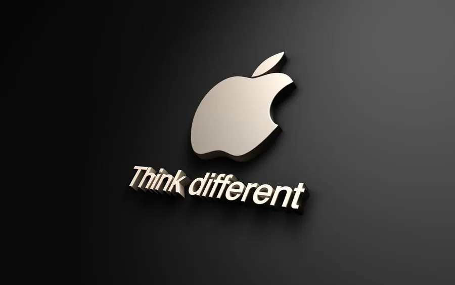 深色背景上帶有「Think different」標語的Apple標誌