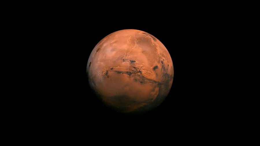 火星,其鏽紅色表面在太空黑暗中可見。