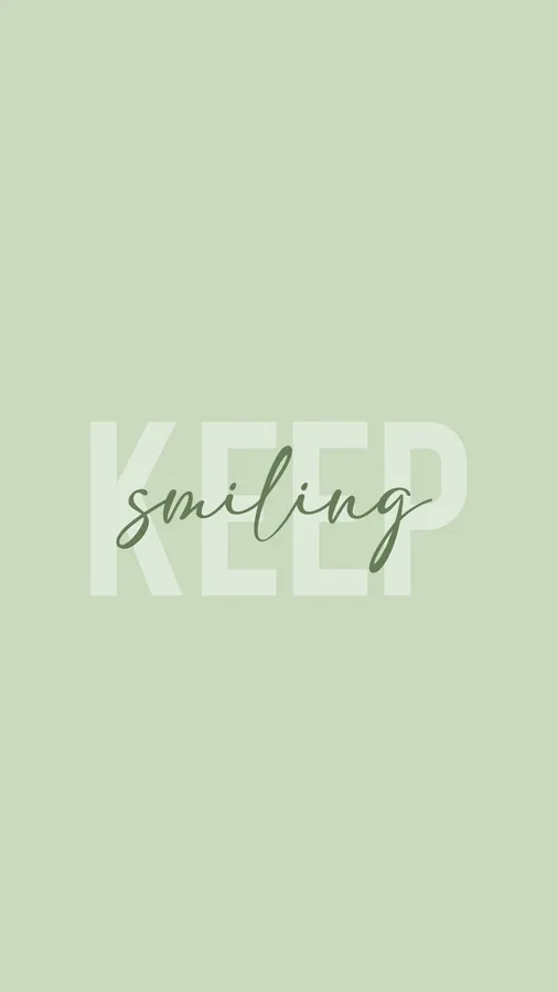 鼠尾草色背景上以白色和綠色顯示的勵志語句 'KEEP smiling'。