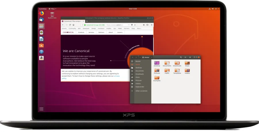 筆記型電腦顯示 Ubuntu 桌面,瀏覽器和檔案管理員已開啟。