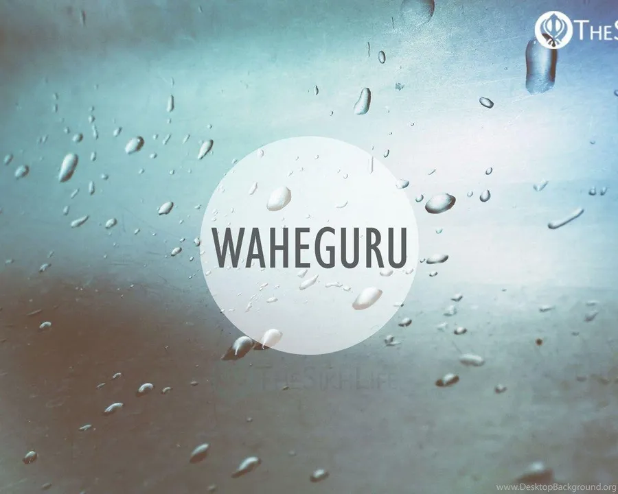 玻璃上的雨滴,白色圓圈中央有WAHEGURU字樣。