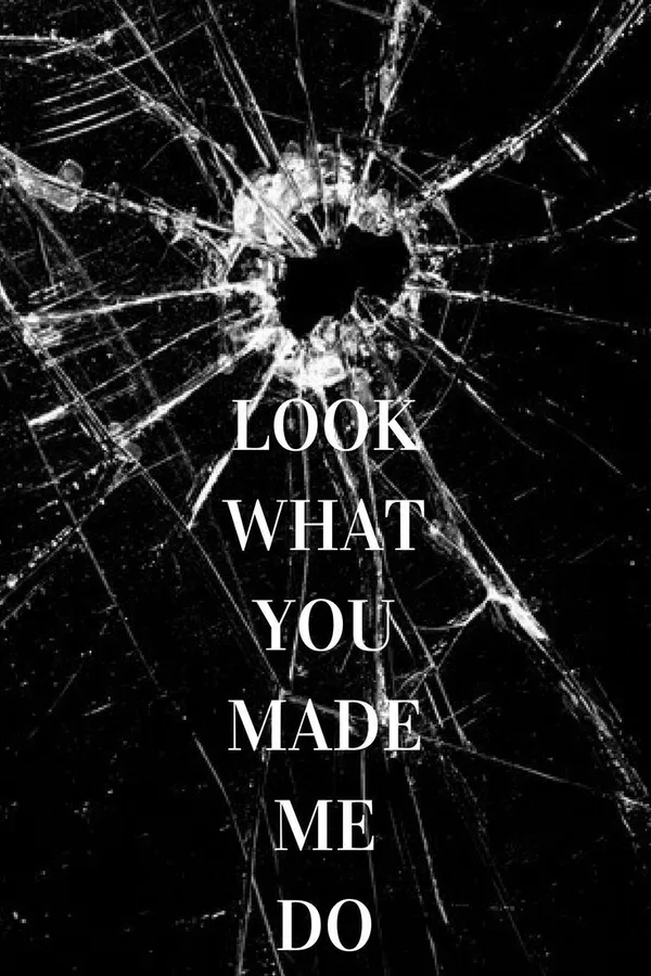 破碎的玻璃,上面有粗體白色文字「LOOK WHAT YOU MADE ME DO」。