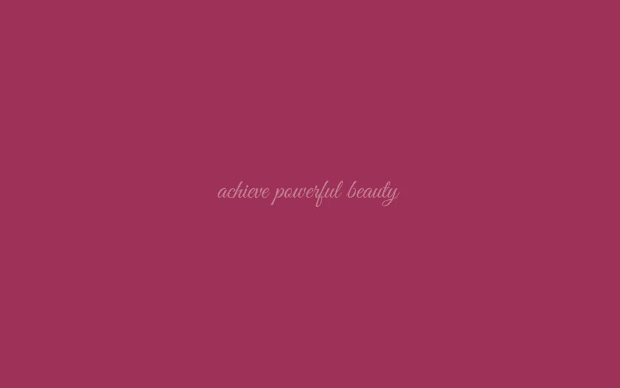 洋紅色背景中央有草書文字「achieve powerful beauty」