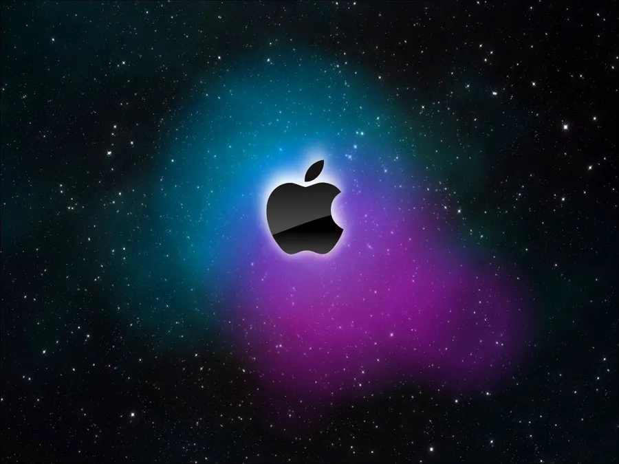 Apple標誌漂浮在星空星雲中,帶有藍色和紫色色調。