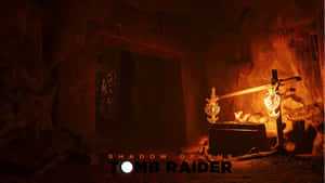 《Shadow of the Tomb Raider》黑暗洞穴中，被燃燒的火把照亮的古老墓穴廢墟。