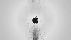灰色皮革上的黑色Apple標誌，粒子從底部升起。