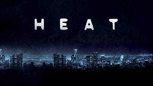 夜晚的城市天際線，上方有發光的白色文字寫著HEAT。 — 邁阿密熱火 壁紙