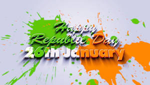 帶有綠色和橙色油漆潑濺的「Happy Republic Day 26th January」文字。
