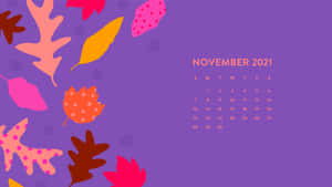 2021年11月日曆，紫色背景上帶有色彩繽紛的秋葉。