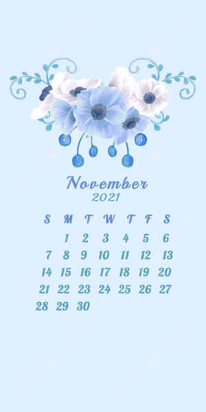 2021年11月月曆，淺藍色背景上帶有藍白花卉設計。