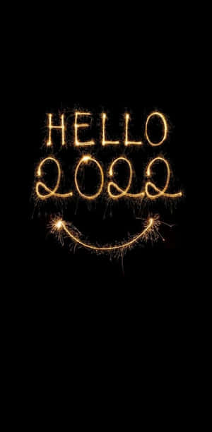煙火文字寫著 hello 2022，附帶笑臉。