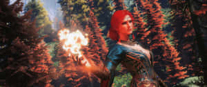 紅髮奇幻女性在秋林中施展火焰魔法 — 巫師3 壁紙