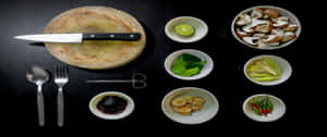 新鮮烹飪食材和工具排列在黑色背景上。 — 3440x1440 壁紙