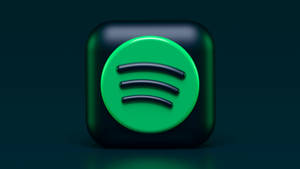 帶有光澤的 Spotify 應用程式圖標，在深色背景上有綠色圓圈和黑色聲波線條。