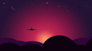 飛機在星空下夜間飛越山脈