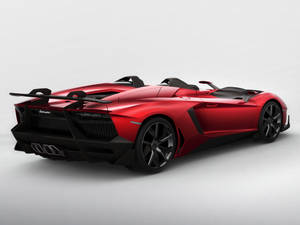 紅色林寶堅尼Aventador Roadster，帶有黑色飾邊和尾翼。