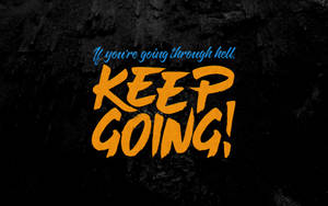 勵志名言壁紙，黑色紋理背景上帶有橙色筆觸文字「KEEP GOING!」。