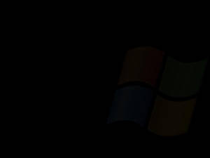Windows 標誌在深色背景上柔和發光。