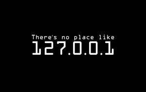 黑色背景上白色數位文字顯示「There's no place like 127.0.0.1」