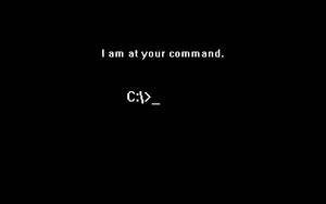 黑色螢幕帶有白色像素化文字「I am at your command.」和「C:>_」。