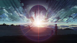 兩個人站在山丘上，看著一顆發光的行星在日落時升起。