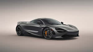 啞光灰色McLaren 720S跑車，帶橙色制動卡鉗，於攝影棚環境中。 — 汽車 壁紙