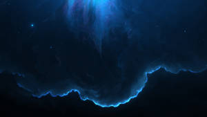 在深空中發光的藍色和紫色星雲，散佈著星星。 — 星雲 壁紙