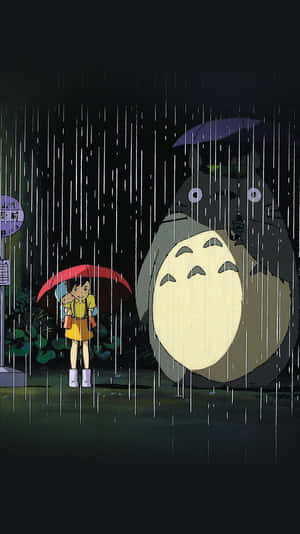 女孩和龍貓在雨傘下共享一個雨夜