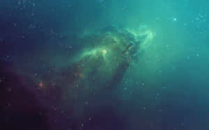 在深空中充滿星星的發光綠色和藍色星雲。