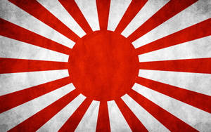 經風化的日本旭日旗，帶有紅白光芒。