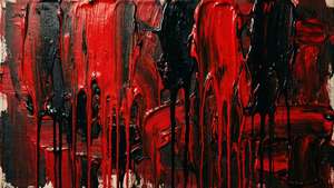 抽象畫，濃厚的紅色和黑色油漆滴落在有紋理的畫布上。