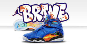 藍色和橙色的 Air Jordan 運動鞋，帶有 'BRAVE' 塗鴉文字。