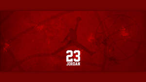 米高佐敦入樽剪影，附有23號和名字，在紅色紋理背景上。 — Air Jordan GIF 壁紙