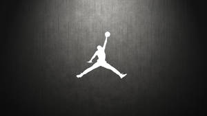 白色Jordan標誌剪影在深色紋理背景上 — Air Jordan GIF 壁紙
