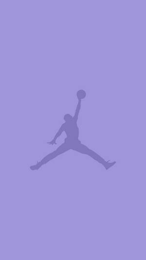 一個籃球運動員跳起灌籃的紫色剪影。 — Air Jordan GIF 壁紙