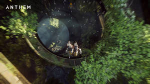兩名裝甲角色在 Anthem 中飛過森林隧道。 — Studio Display 壁紙