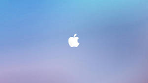 白色Apple標誌在藍色到紫色的漸變背景上。