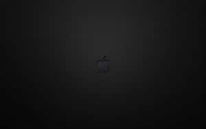 Apple標誌在深色碳纖維紋理背景上